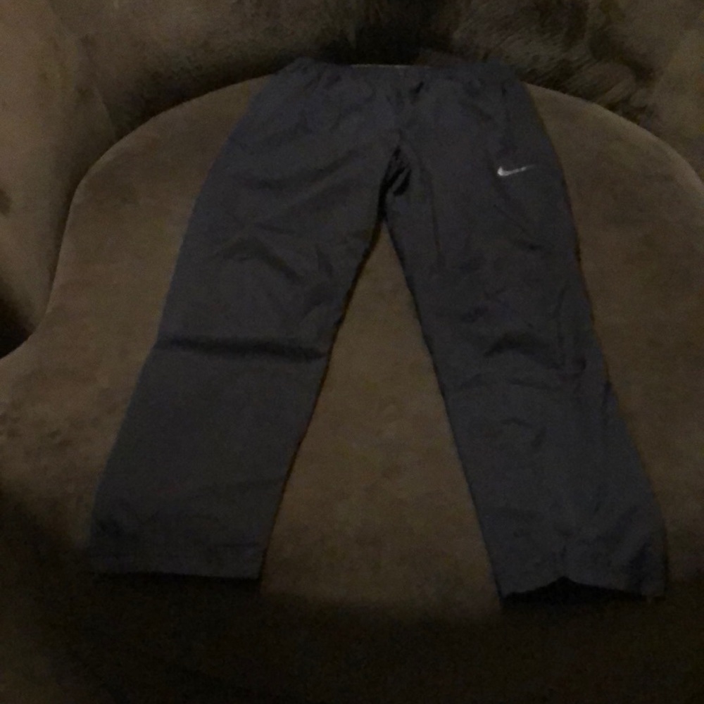 NWT Nike Women’s Running Pants. Reflecting details